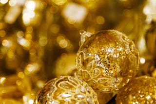 Gold Ornaments Sparkling by the Tree