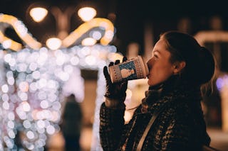 Woman Drinking Holiday Latte