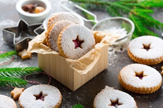 Between their powdered layers Linzer cookies hide a jammy center.