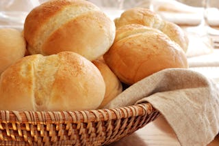 Hot and fresh Christmas dinner rolls in a basket.