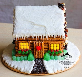Log cabin gingerbread house (image via Gingerbread Journal).