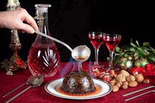 Christmas pudding covered in flaming brandy.