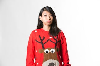 Typical response to getting an ugly Christmas sweater for a gift.